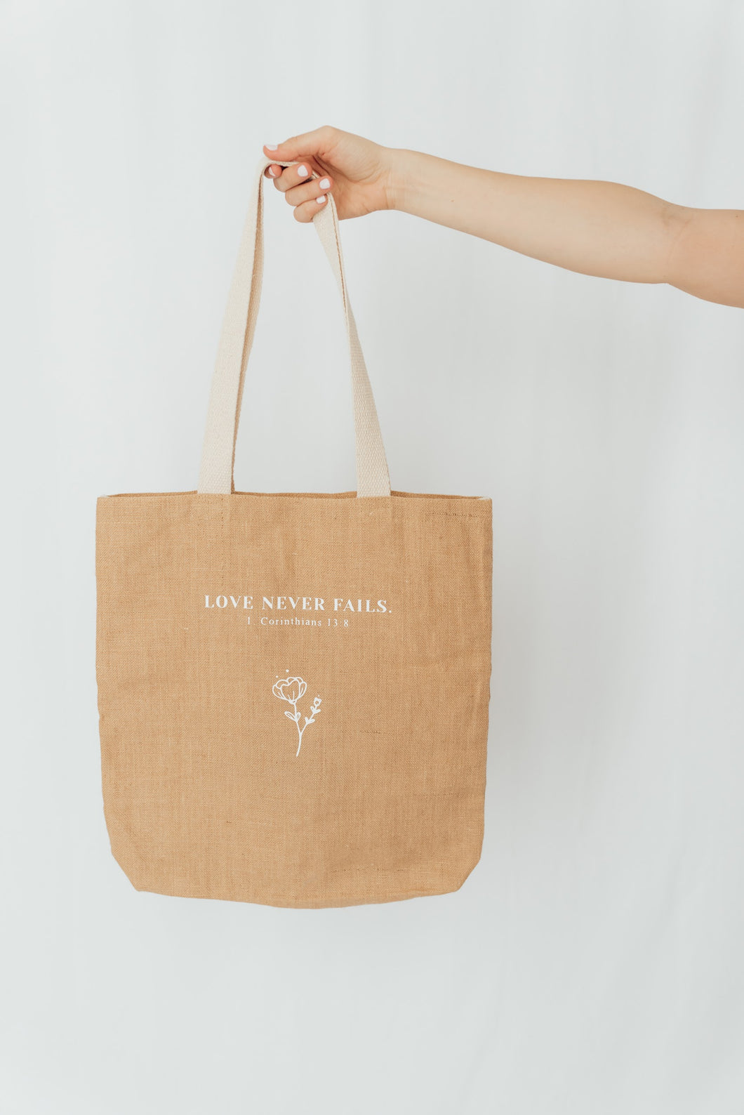 Jute tasche 'Love never fails'
